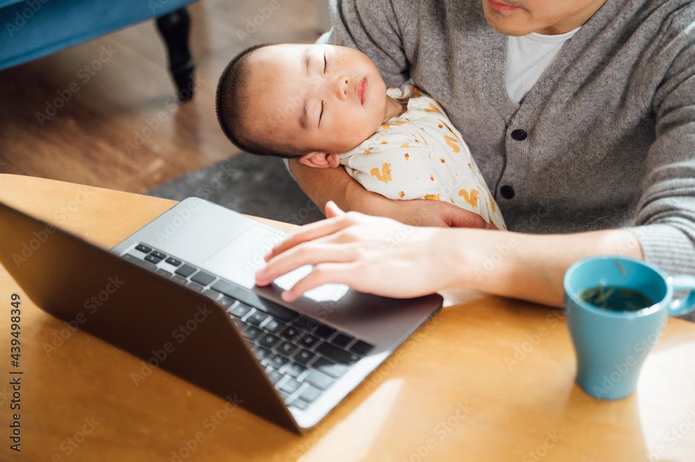 father and baby at home