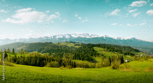 Panorama of snow-capped Tatry Mountains on Podhale in Poland photo