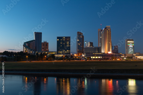View of the business center of the city in the evening at sunset. Office buildings and the river. Vilnius Lithuania.