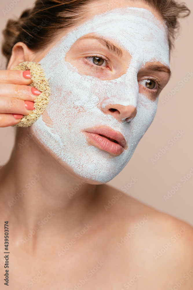 Removing Facial Mask With Sponge Removing Facial Mask With Sponge