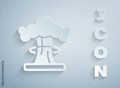 Paper cut Nuclear explosion icon isolated on grey background. Atomic bomb. Symbol of nuclear war, end of world. Paper art style. Vector
