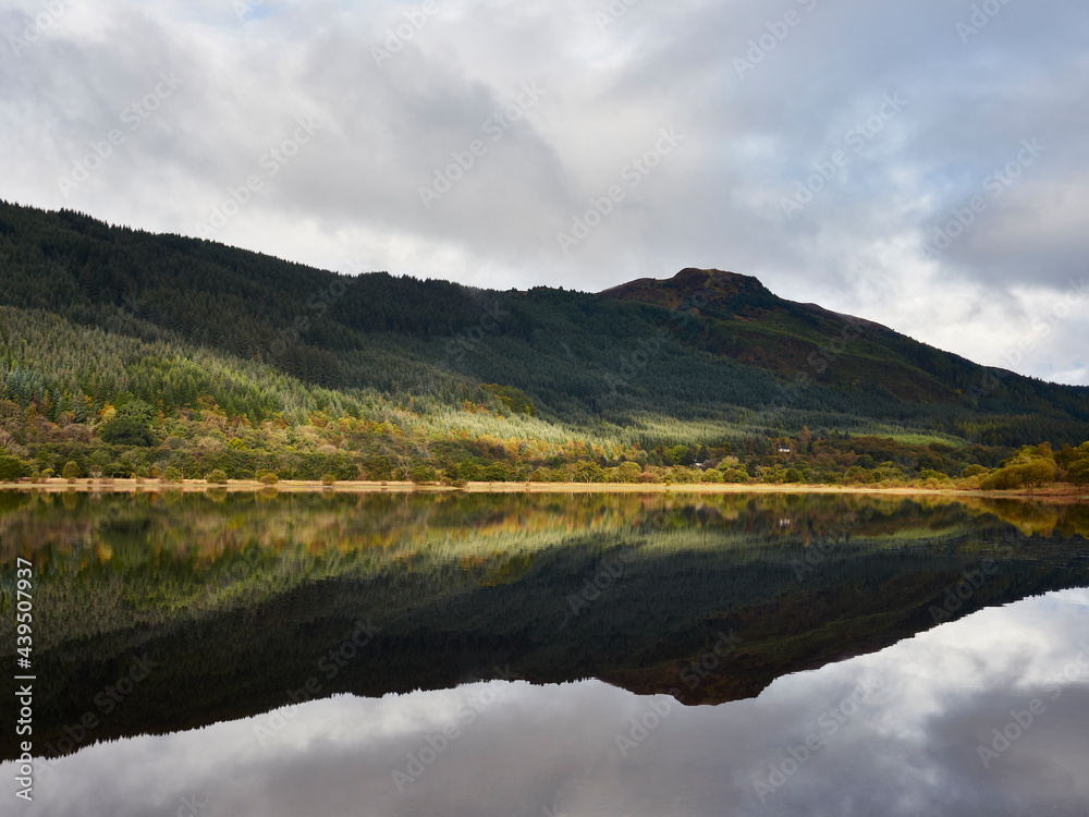 Sunrise reflections on Loch Lubnaig. Loch Lomond and the Trossachs. Sunrise reflections on Loch Lubnaig. Loch Lomond and the Trossachs.