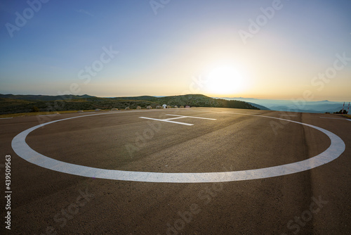 Empty helipad on top of a peak in a country side remote location