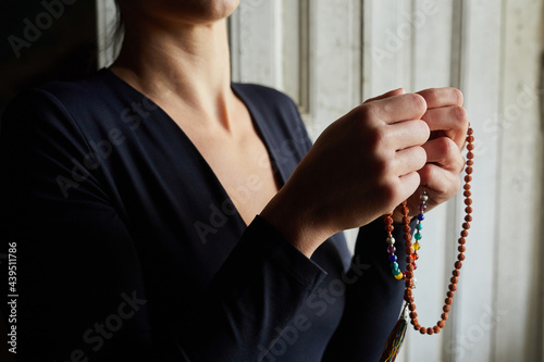 Woman doing a prayer. photo