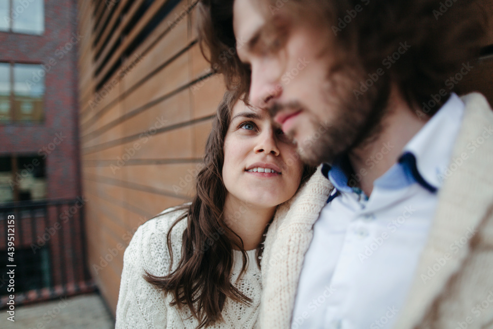 Portrait of young happy loving couple on the walk. Portrait of young happy loving couple on the walk.