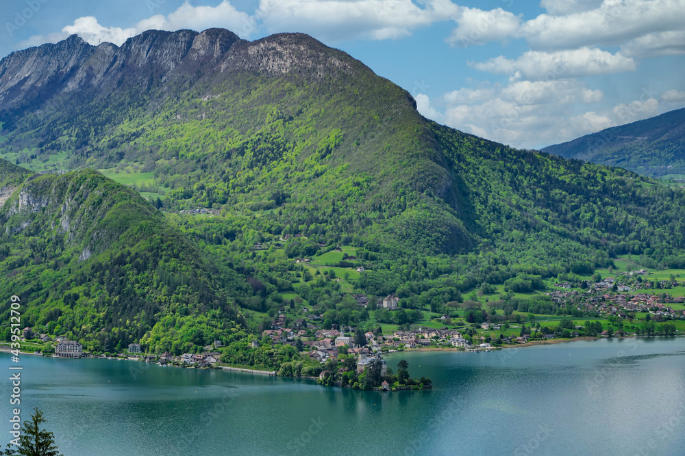 beautiful view on french Alps at lake Annecy with Duingt village, France