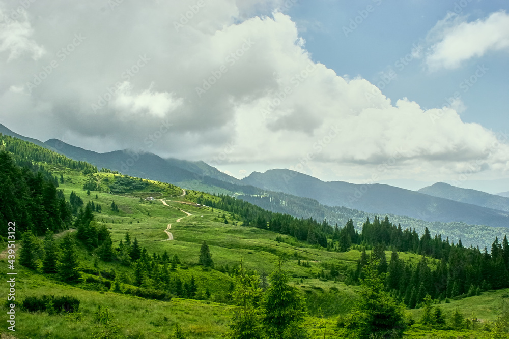 Summer landscape in carpathian mountains with cloudy sky. Carpathian, Ukraine, Europe.