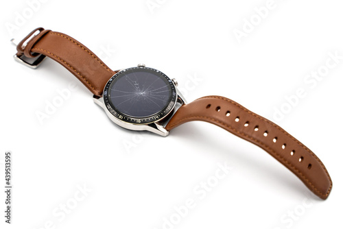 Smart watch with broken display screen isolated on white background