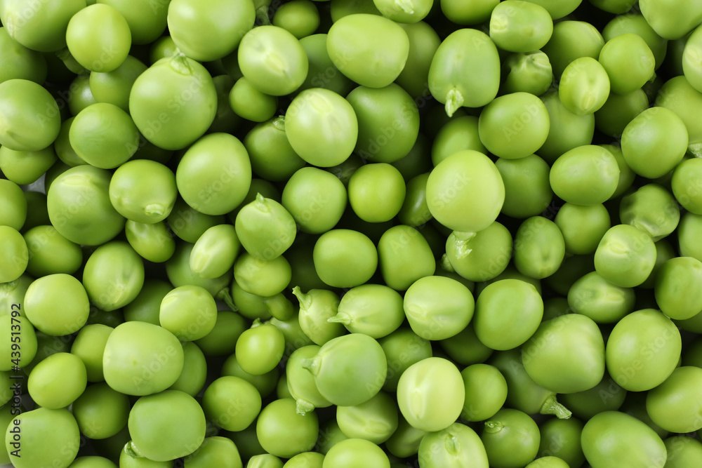 Green pea seeds on whole background, close up Green pea seeds on whole background, close up