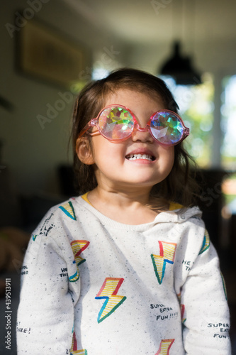 Cute kid in funny sunglasses photo