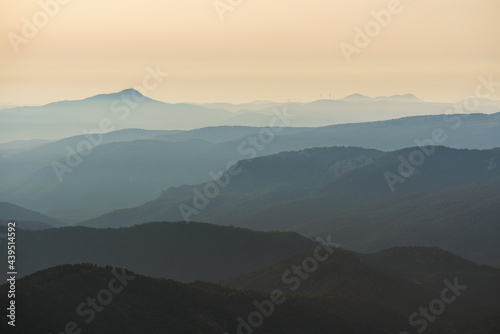View of different gradient layers of mountains at dusk