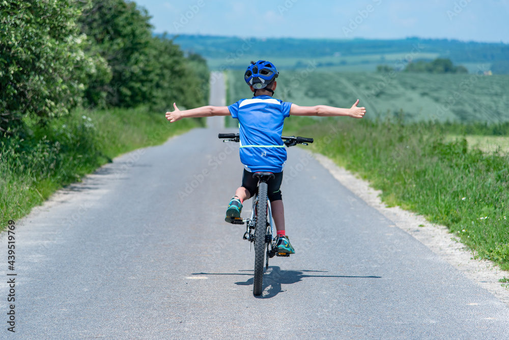 Obraz premium Bicycling is TOP - young boy