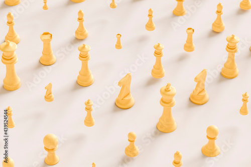 chess pieces in yellow on grey background