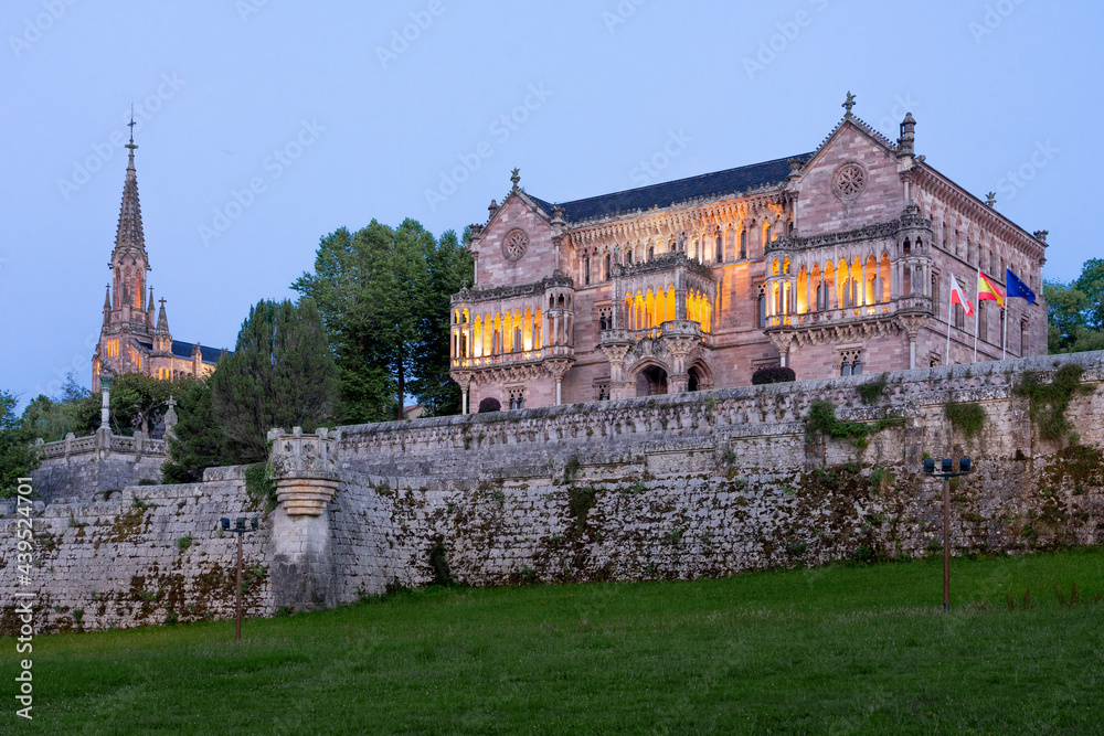 COMILLAS, SPAIN - JULY 07, 2020: Sobrellano palace illuminated at night in Comillas, Cantabria, Spain.