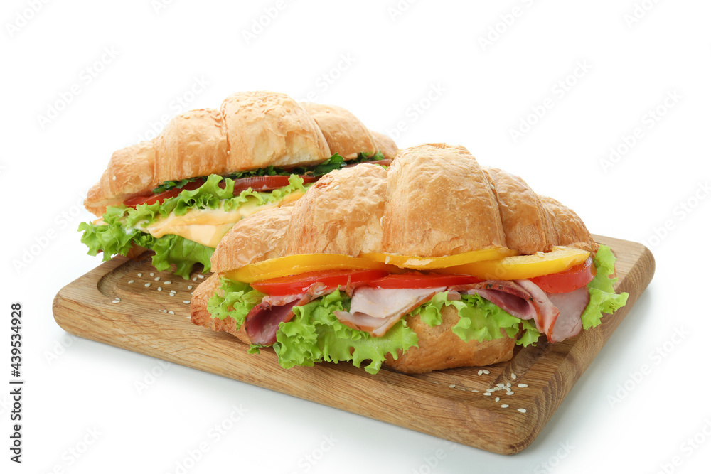 Board with croissant sandwiches isolated on white background Board with croissant sandwiches isolated on white background