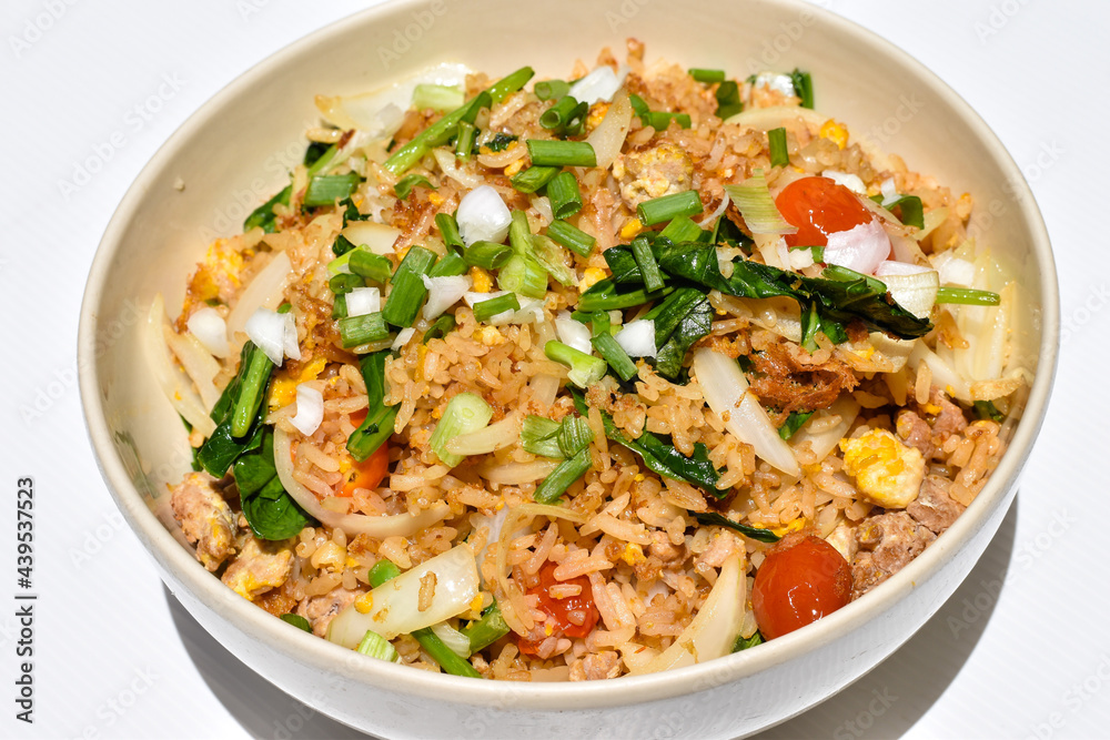 close up of home made fried rice on white backgrounds close up of home made fried rice on white backgrounds