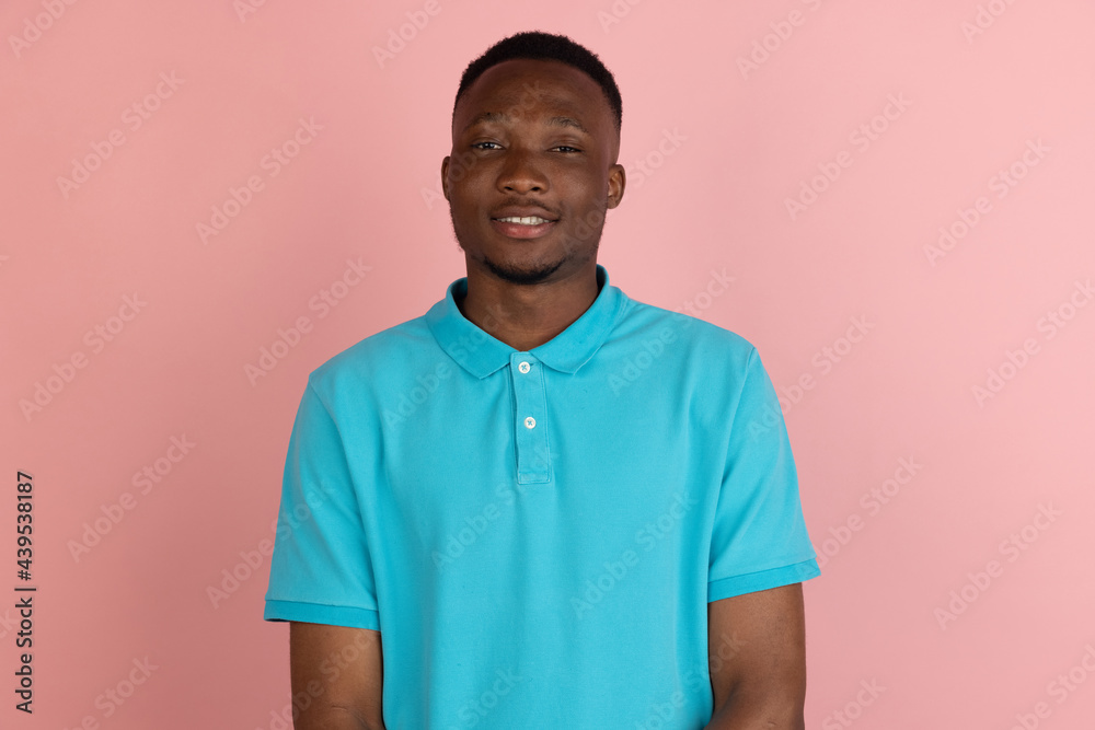 African young male portrait isolated over studio background with copyspace