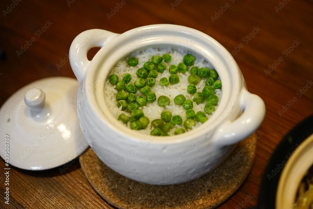 Closeup delicious home made food, green peas and rice Closeup delicious home made food, green peas and rice