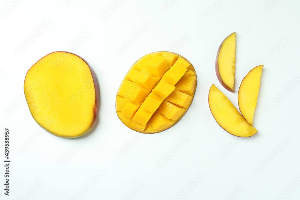 Ripe mango fruit on white background, top view
