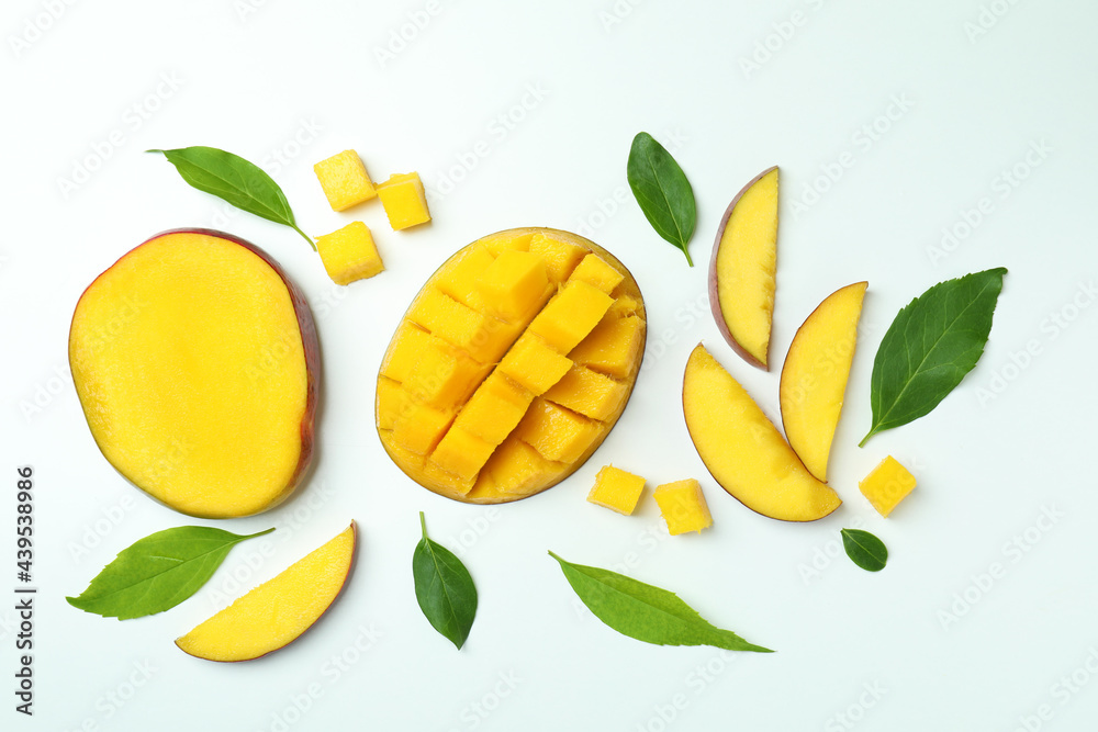 Ripe mango fruit on white background, top view Ripe mango fruit on white background, top view