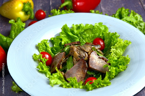 Warm salad with meat. Tasty and nutritious food