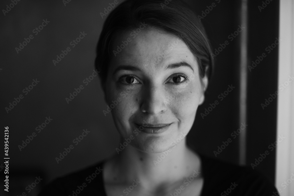 headshot portrait of a beautiful young woman