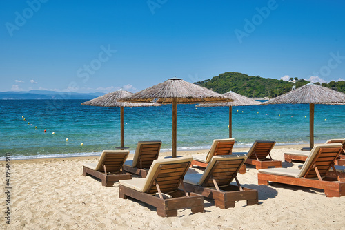 Holidays in the Greek islands, Koukounaries beach, Skiathos island, Greece, summer 2021 photo