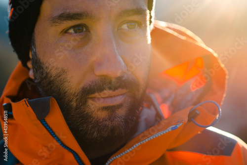 Traveling man in outerwear in nature 