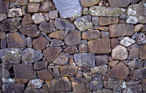 Close up detail of patterns and textures of a drystone rock wall