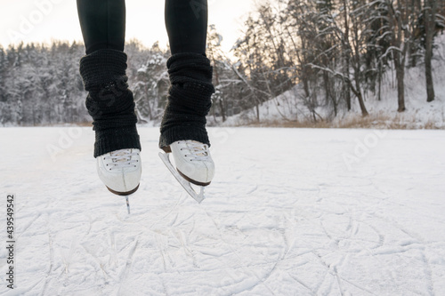 Anonymous Figure Skater Jump Outdoors photo