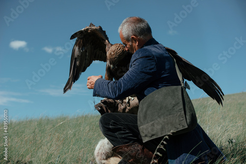 A man and an eagle photo