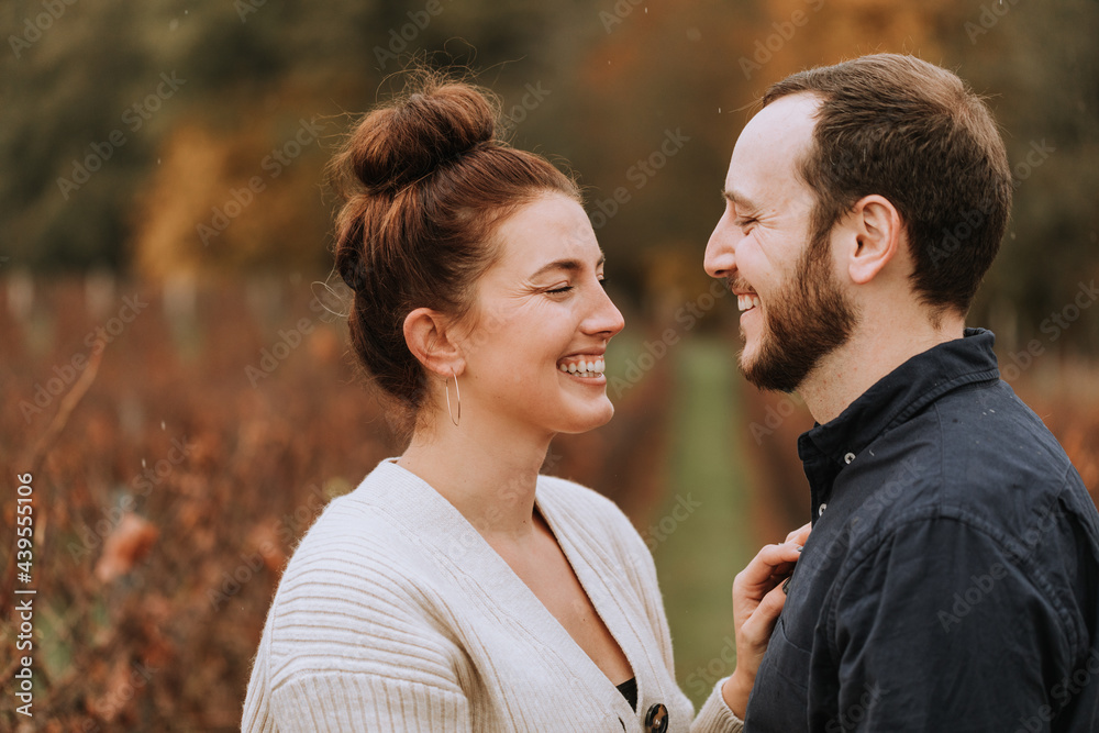 Happy, Laughing Couple in Rain Happy, Laughing Couple in Rain