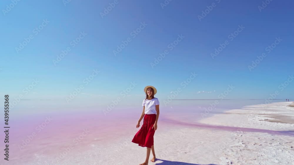 stylish summer girl enjoying walking by bright pink lake, summer adventure traveling stylish summer girl enjoying walking by bright pink lake, summer adventure traveling