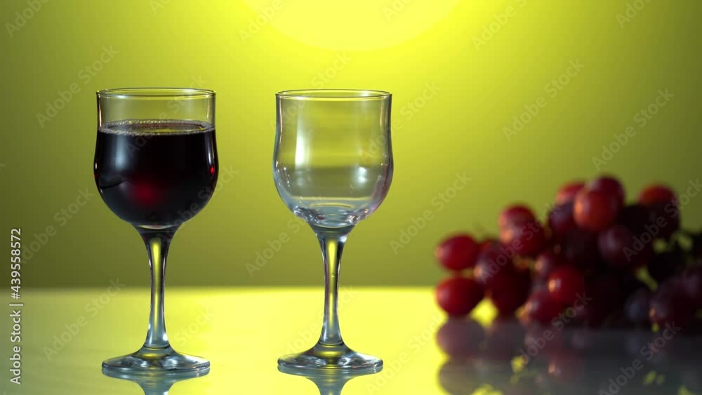 Creative shot slow motion raw video of red wine. Man's hand put empty glass for a wine. Creative shot slow motion raw video of red wine. Man's hand put empty glass for a wine.