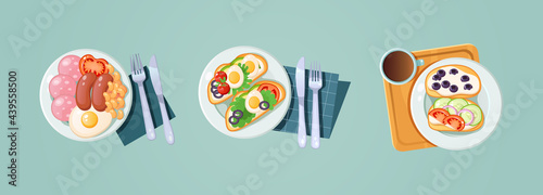 Morning healthy food top view. Set classic breakfast dish with beverage. Appetizing serving eggs salad toasts, sandwiches, scrambled eggs, sausages, vegetables c