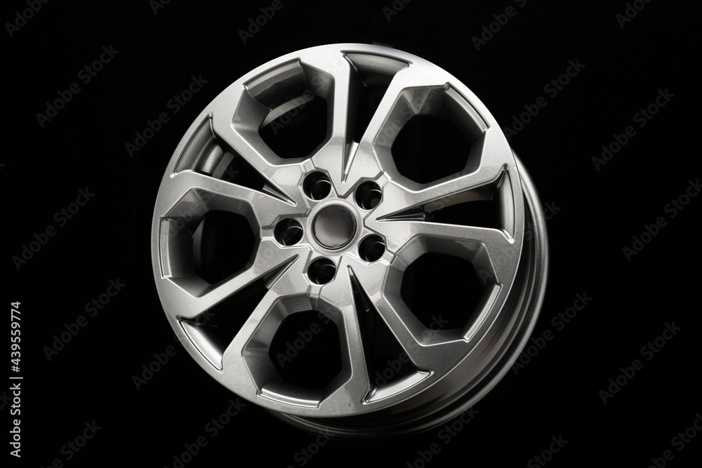 grey alloy wheels, stylish unusual design, dark background