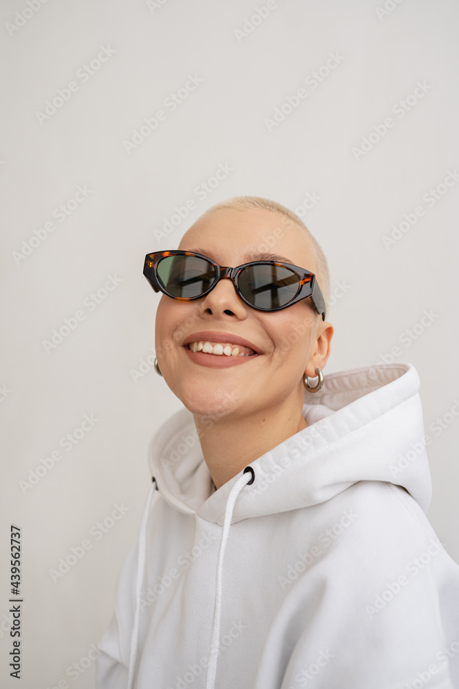 Portrait of Stylish short haired woman in sunglasses Portrait of Stylish short haired woman in sunglasses