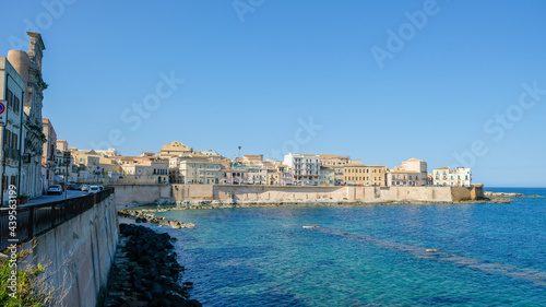 Ortigia island, Syracuse, Sicily. View of the beautiful seafront of the island, and Cala Rossa beach.