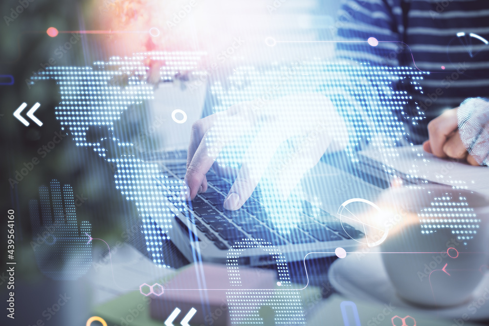 Double exposure of woman hands working on computer and world map hologram drawing. International technology business concept. Double exposure of woman hands working on computer and world map hologram drawing. International technology business concept.