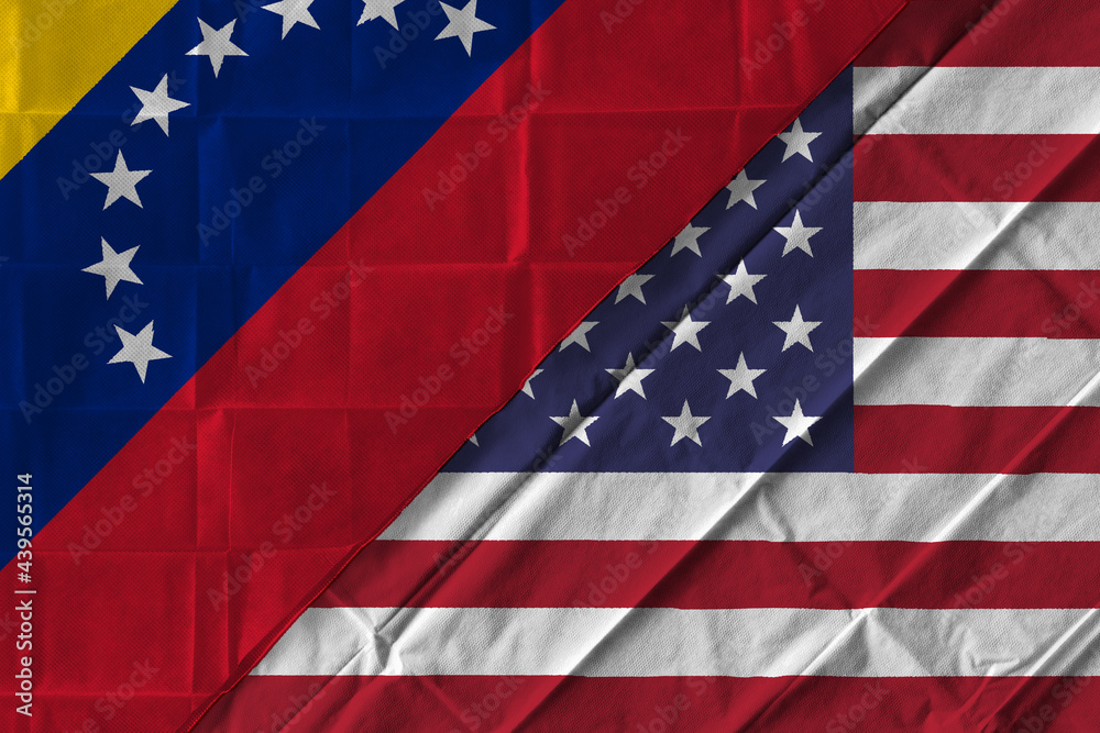 Fototapeta premium Concept of the relationship between the United States of America (USA) and Venezuela with two flags over each other