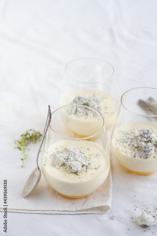 Lemon mousse topped with meringue in glass Lemon mousse topped with meringue in glass