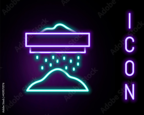 Glowing neon line Sifting flour, cereals or powdered sugar through sieve icon isolated on black background. Colorful outline concept. Vector