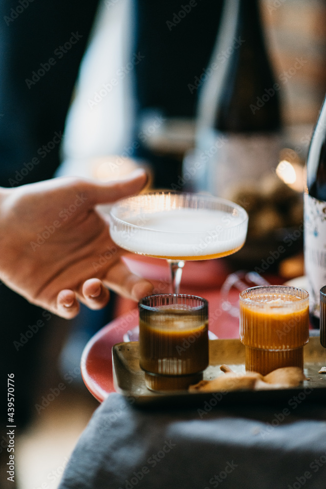 Serving small pumpkin soup appetizers Serving small pumpkin soup appetizers
