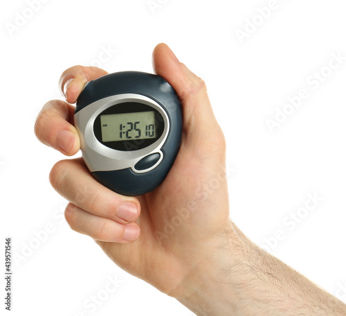 Man holding digital timer on white background, closeup