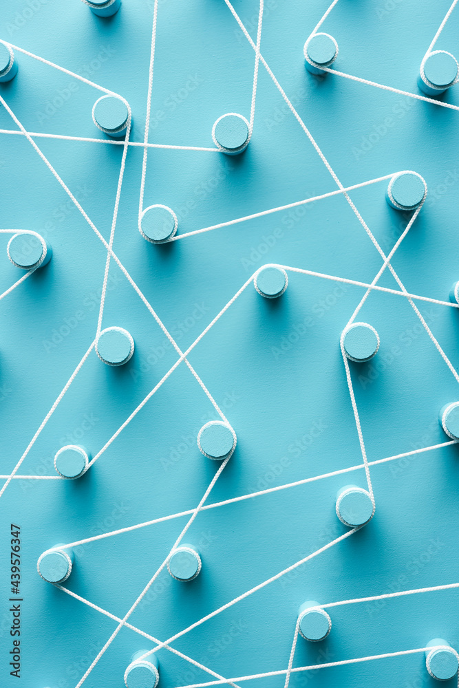 Blue pegs connected with rope together