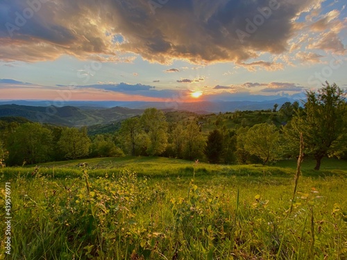 Epic sunset landscape on a hill in Romania