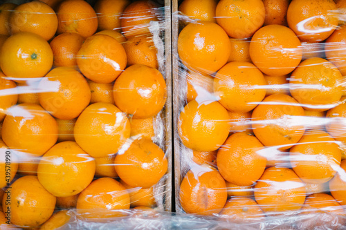 two orange´s packs fruits photo