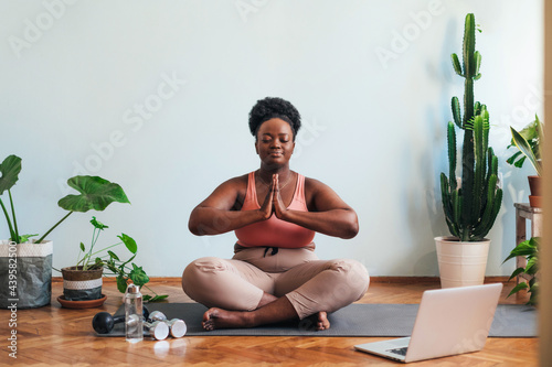 Woman Meditating in the Studio