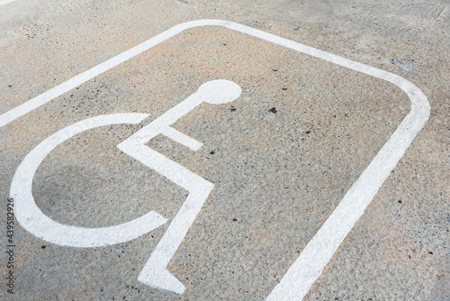.The parking spaces for disabled people on the street in the parking lot.