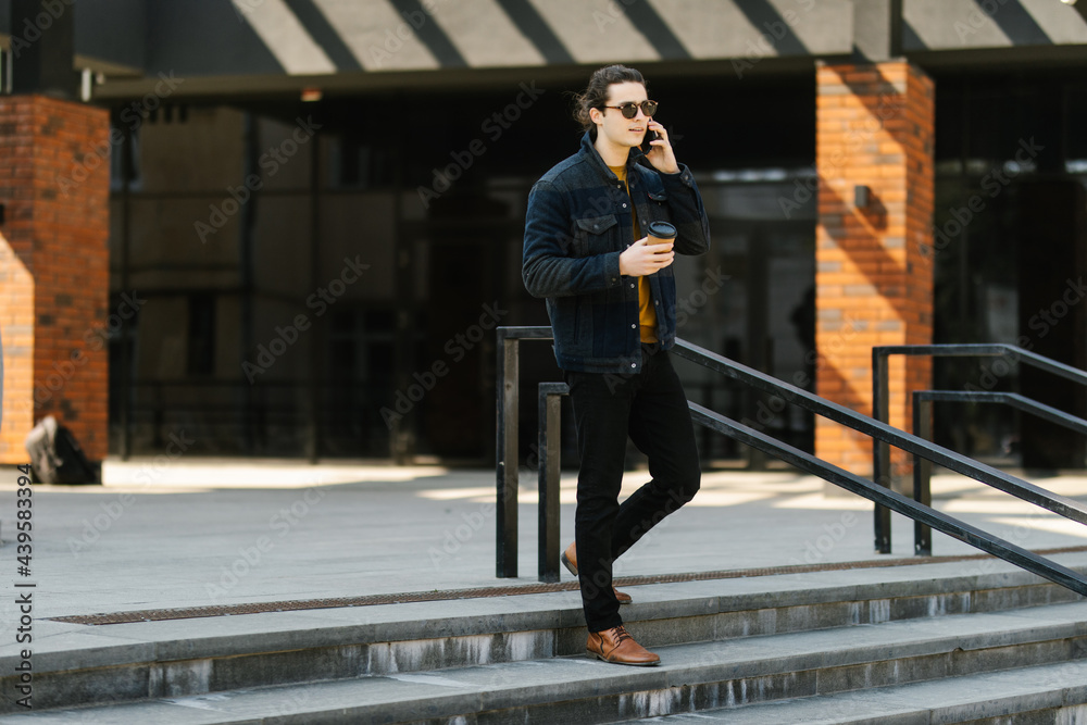 Handsome man cell phone call smile outdoor city street,